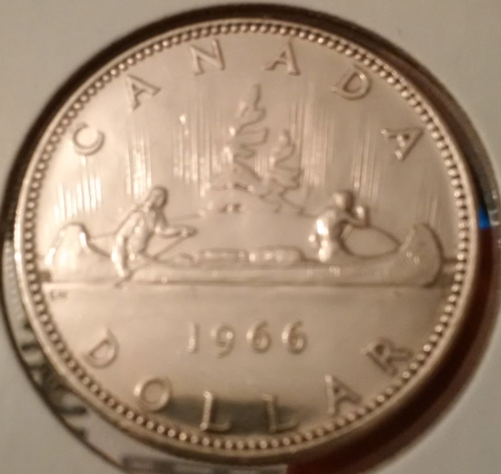 Help-With-Identifying-1886-25-Cent-And-1966-Dollar